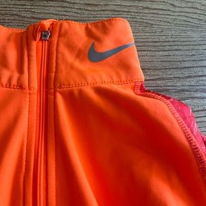 Nike 3/4 zip dry fit running short. Excellent condition size small